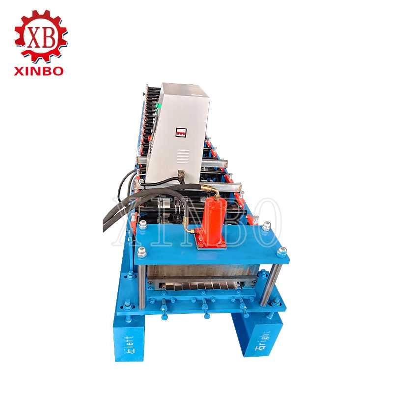 Front view of a snap lock standing seam roll forming machine with hydraulic cutting unit
