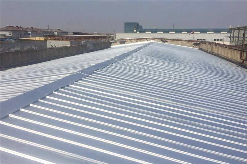 Installed standing seam metal roofing on an industrial building