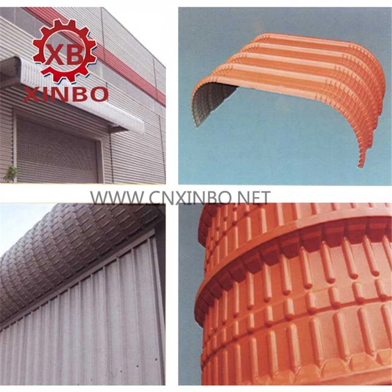 Curved steel roof panels for arch building applications
