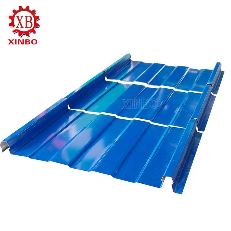 Finished blue clip-lock roof panels with interlocking side edges