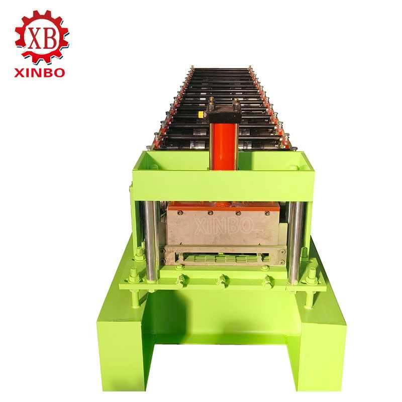 Front view of an XINBO clip-lock roof panel roll forming machine