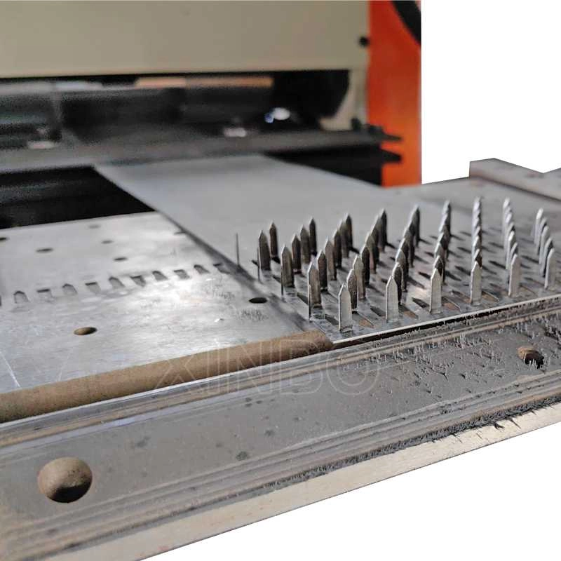 Close-up of toothed metal connector plates after stamping